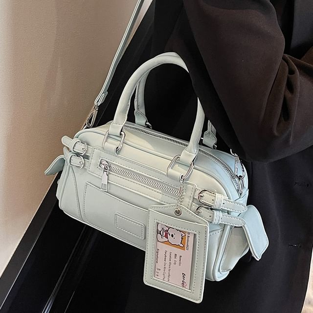 Basaran-Buckled Flap Pocket Panel Bowler Bag
