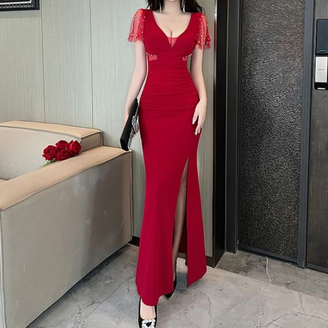 knee length dresses for ladies Long Beaded V Neckline Dress With Deep V And Mesh Side Panels