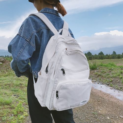 White discount canvas backpack