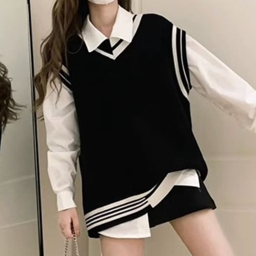 white shirt with black knitted vest