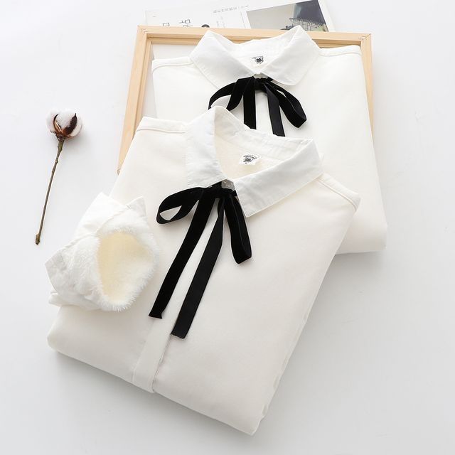 white shirt with ribbon tie