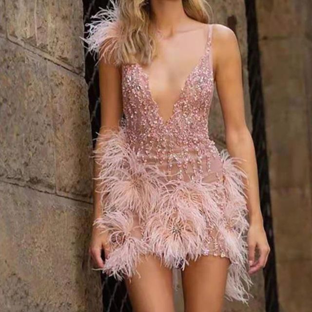 Sequin dress with feathers