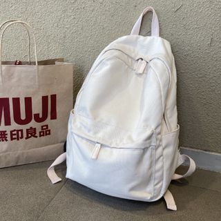 white canvas backpack