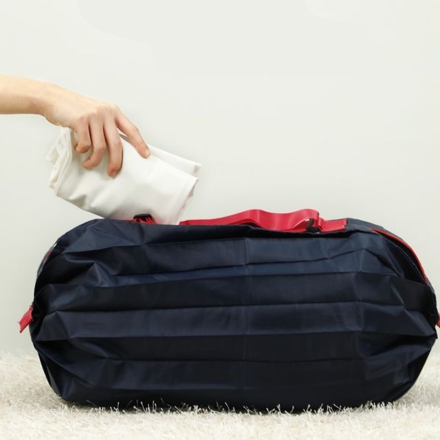 common haus-Rolling Up Bag
