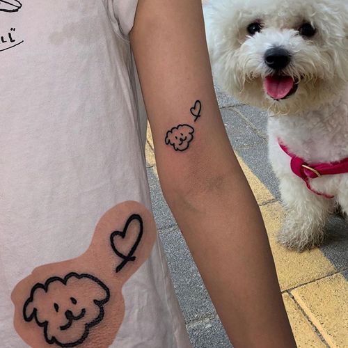 Minimal Puppy Tattoo with Cute Paw Prints