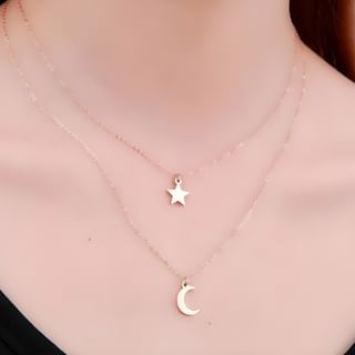 layered necklace moon and stars