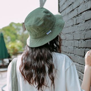 green fishing hat