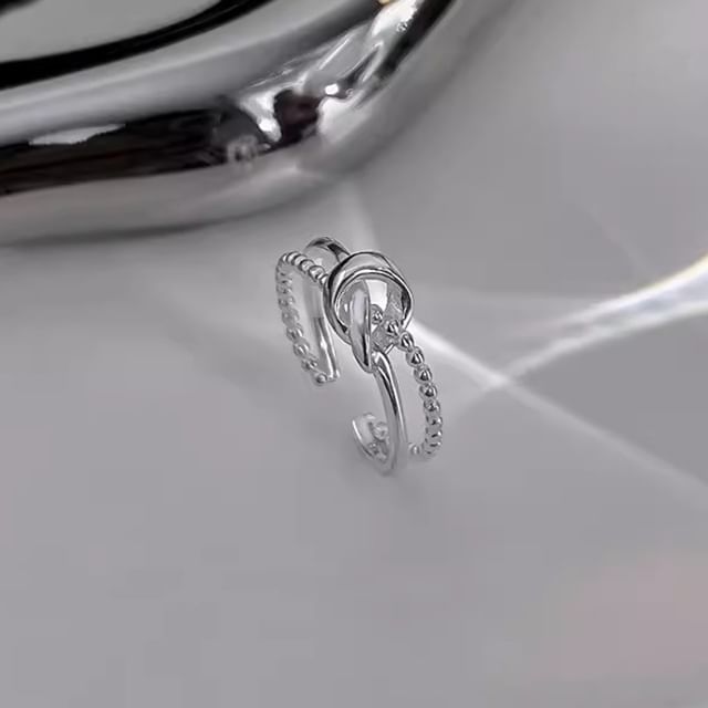 Halfla-Twisted Layered Ring