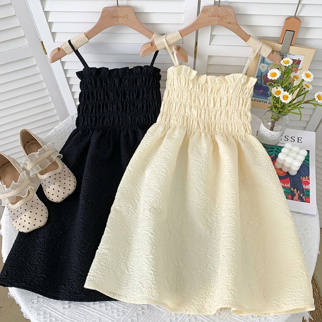 sleeveless smocked mini dress