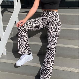 Puffie Zebra Print Flared Pants | YesStyle
