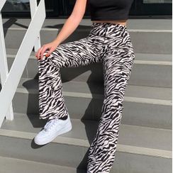 Puffie - Zebra Print Flared Pants