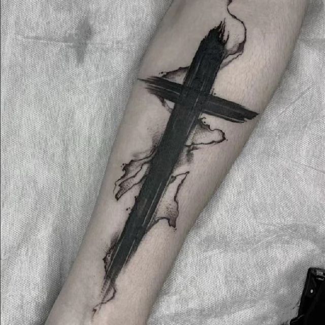 barbed wire cross tattoo
