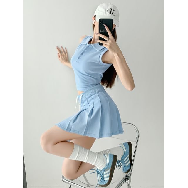 Shira - Cropped Sleeveless Polo Shirt / Pleated Mini Skirt