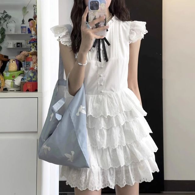 chinese dress ladies Verdusa Women's Floral Print Ruffle Trim Cap Sleeve Tie Back A Line Mini  Dress White S at Amazon Women's Clothing store main image 1