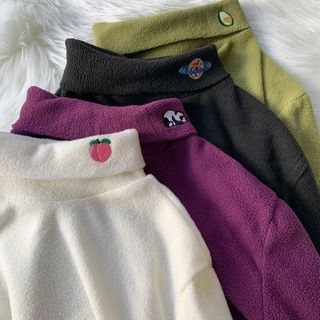 embroidered mock neck