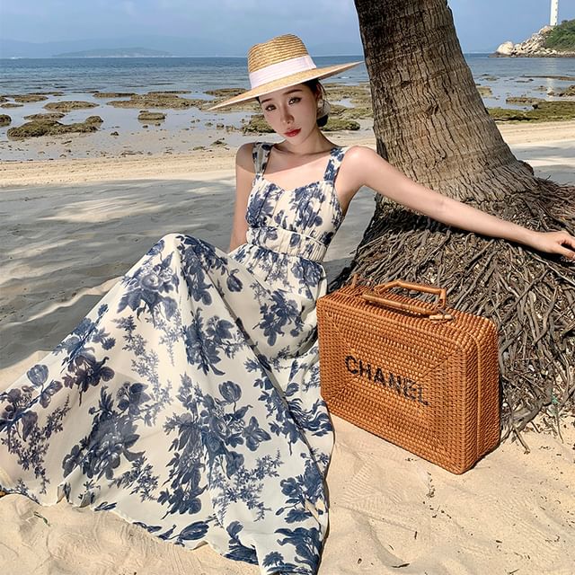 Juuri - Sleeveless V-Neck Floral Print Smocked Open Back Maxi A-Line Dress 