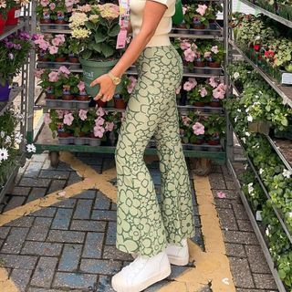 ★送料・関税込★SAENGIN STUDIOS★MESH FLOWER BOOTCUT PANTS★ Sosana - High-Waist Floral Print Boot-Cut Pants | YesStyle