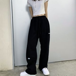 sweatpants with bird logo