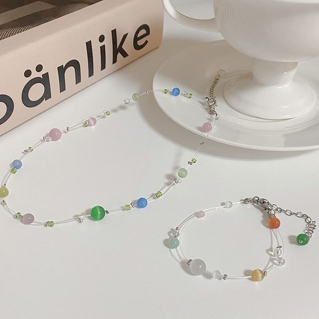 Jarogue Faux Cat Eye Stone Bead Fishing Line Necklace / Bracelet