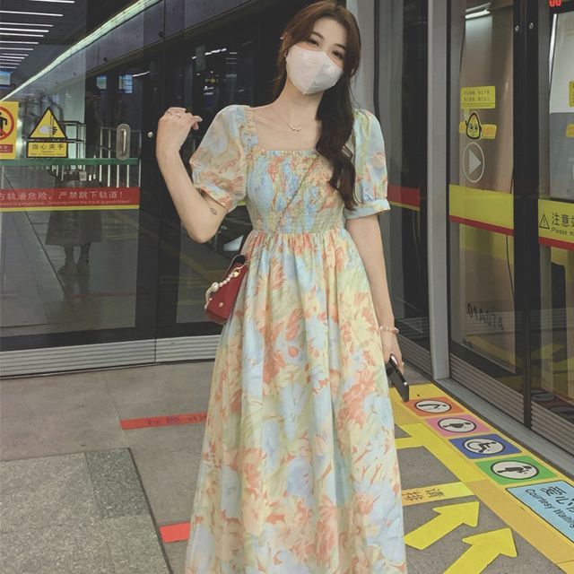 westside a line dress Westside Story - Spaghetti Strap Floral Print Ruffled High-Low Midi A-Line Dress