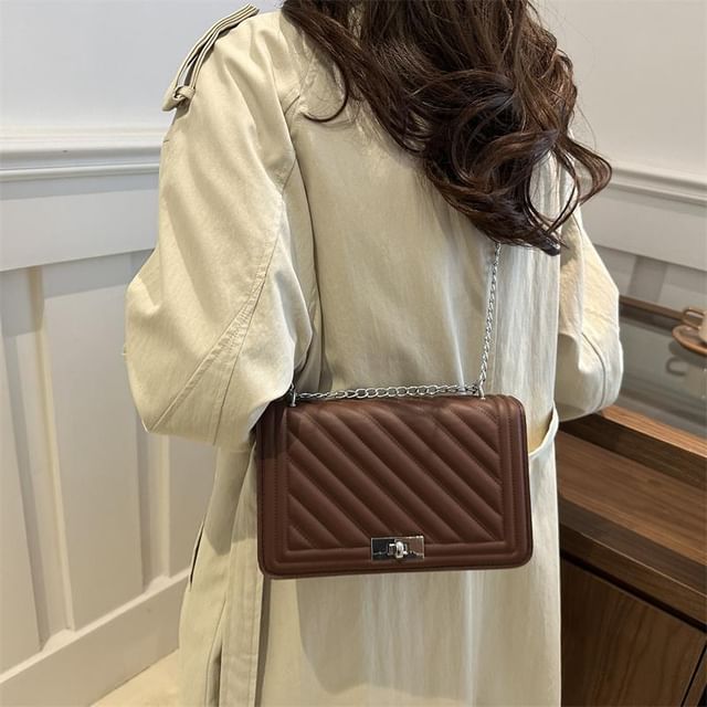 Indenis-Quilted Buckle Shoulder Bag
