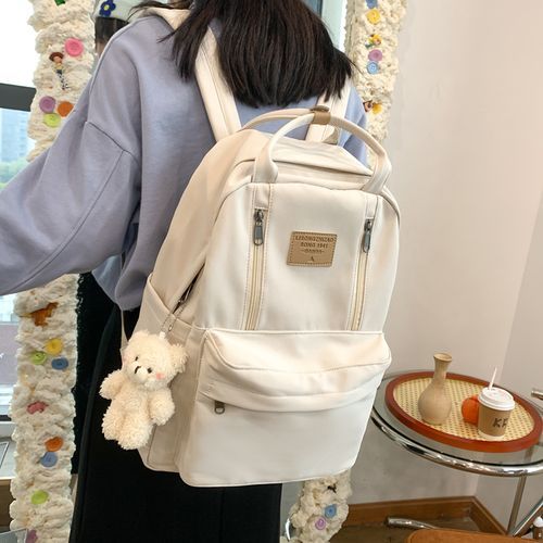 Backpack with 2025 top handle