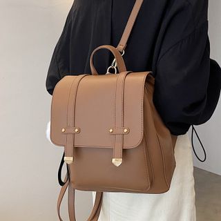 leather flap backpack