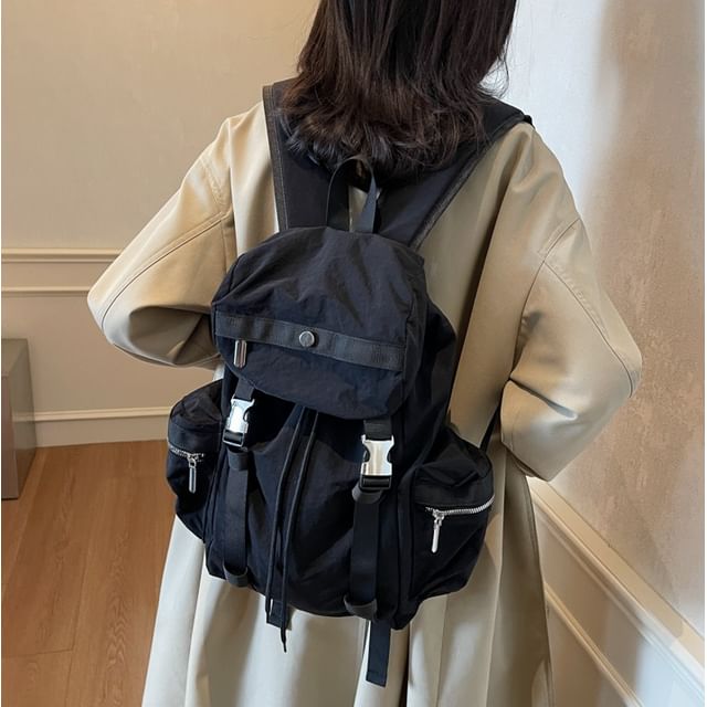Skyglow-Buckled Multi-Pocket Backpack