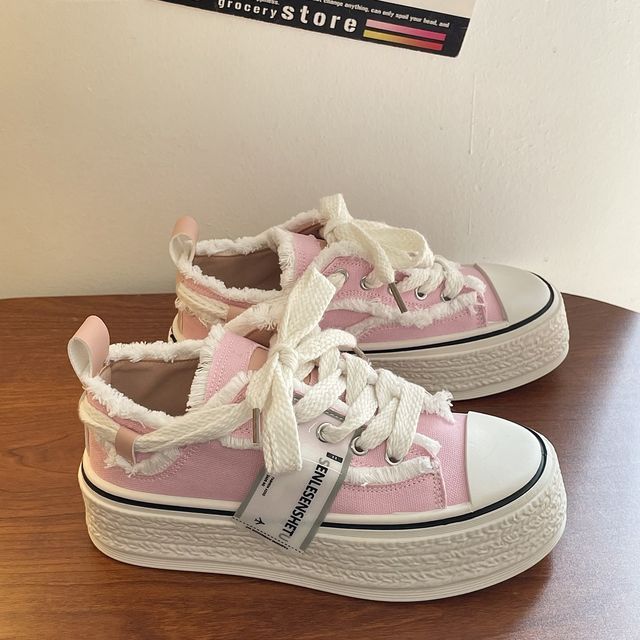 Distressed best sale canvas sneakers