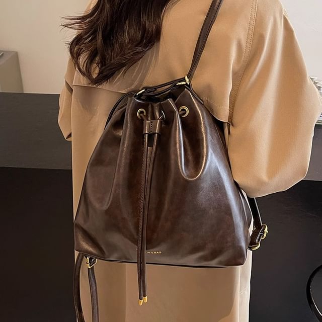 Skyglow-Drawstring Faux Leather Backpack