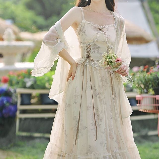 Nebbia Spaghetti Strap Floral Print Lace Up Ruffle Maxi A-Line