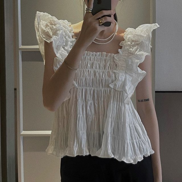 Odestra-Sleeveless Ruffle Blouse