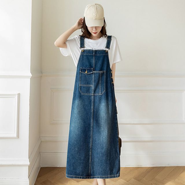 a line dungaree dress Utility Dungaree Dress in Orange – First Stitch main image 0
