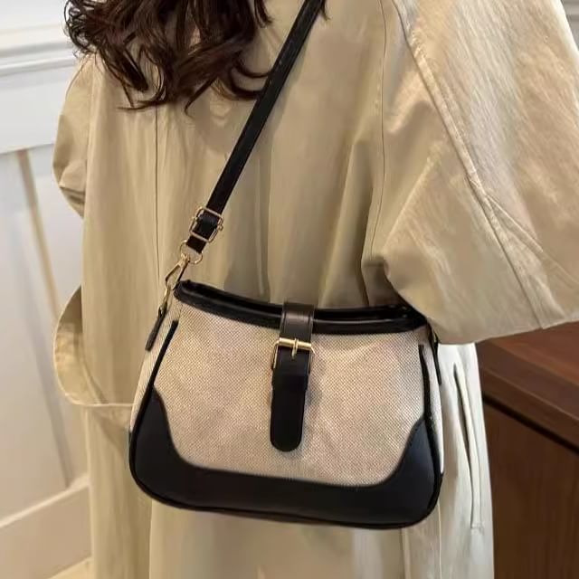Indenis-Buckled Panel Crossbody Bag