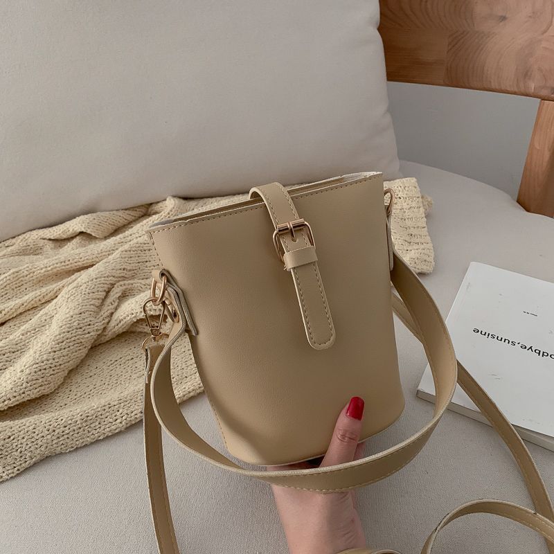 leather crossbody bucket bag