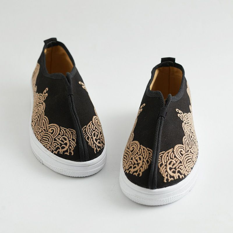 embroidered slip ons