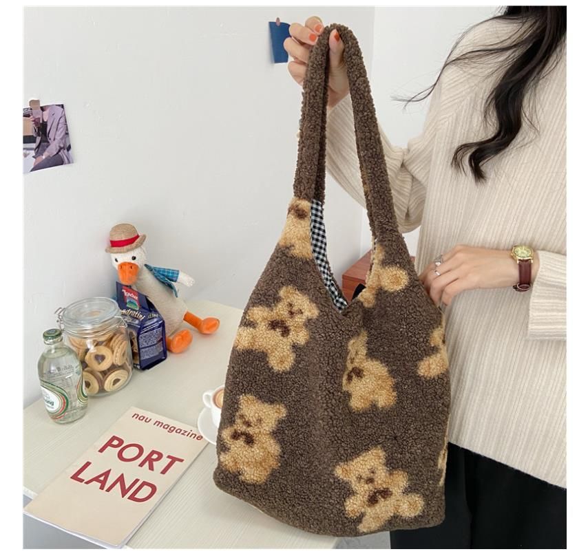 handbag with teddy bear