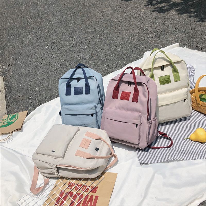 backpack with two handles on top