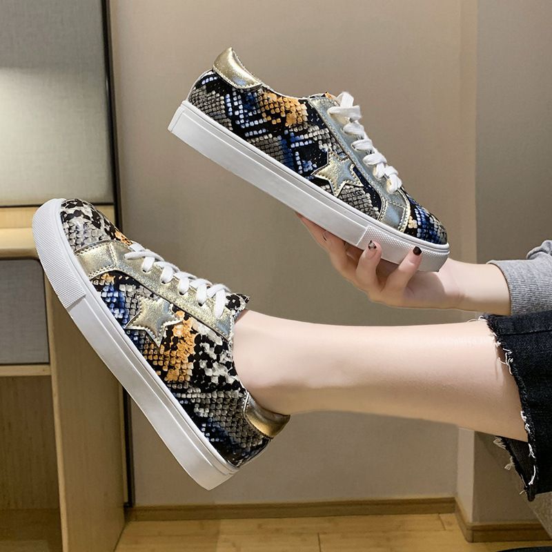 snakeskin print sneakers