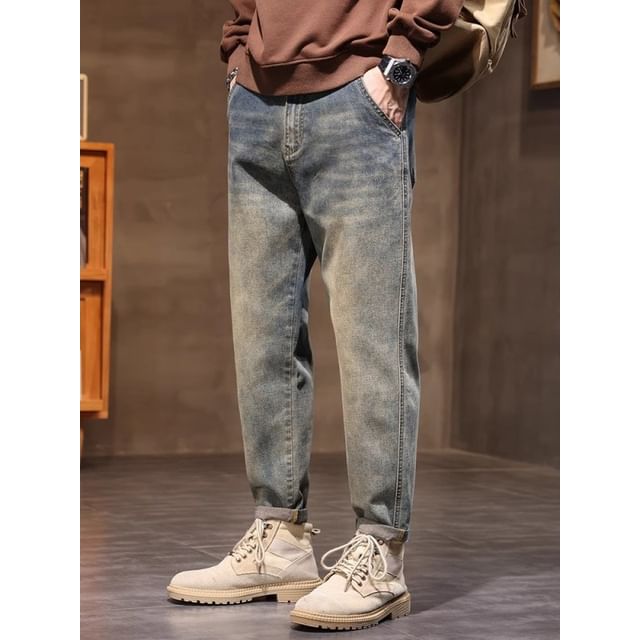Acrius-Mid Rise Washed Tapered Jeans
