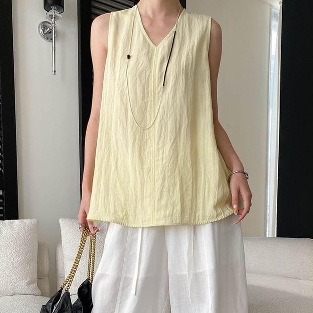 Asiris-Sleeveless V-Neck Plain Blouse