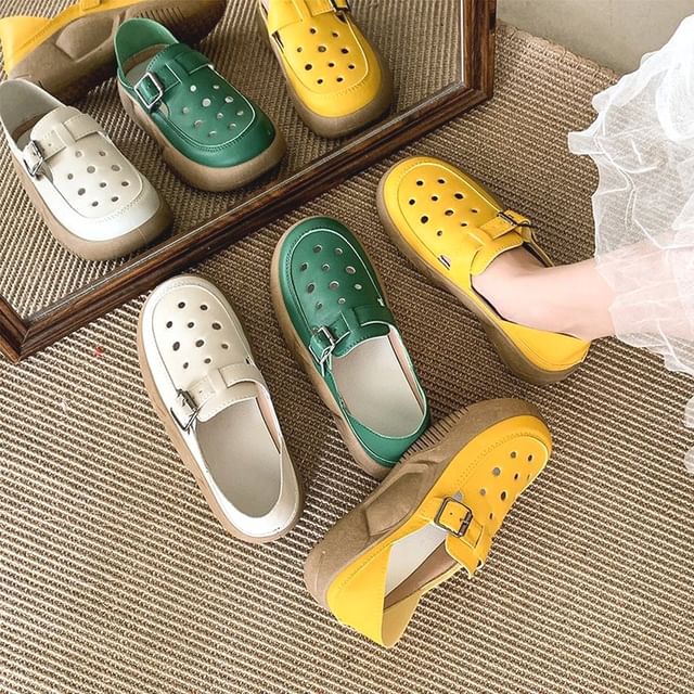 Asterisk-Buckled Cutout Platform Loafers