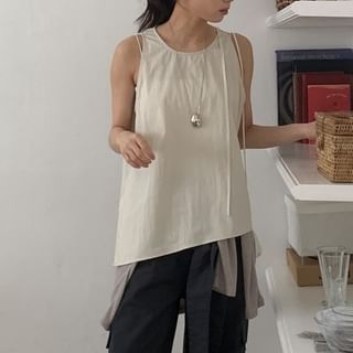 Coris-Sleeveless Asymmetrical Plain Top