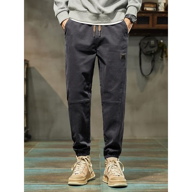 DuckleBeam-Drawstring Waist Plain Panel Cropped Tapered Pants