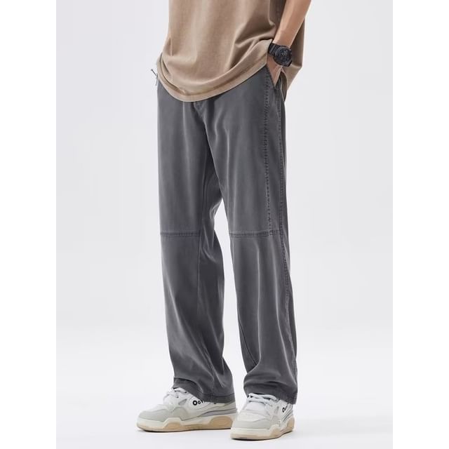 Femilina-Mid Rise Plain Panel Tapered Pants