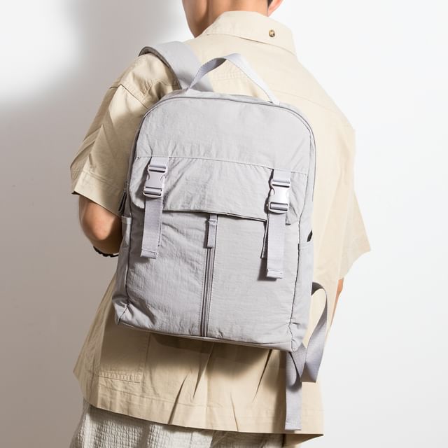 krokki-Plain Buckled Canvas Laptop Backpack