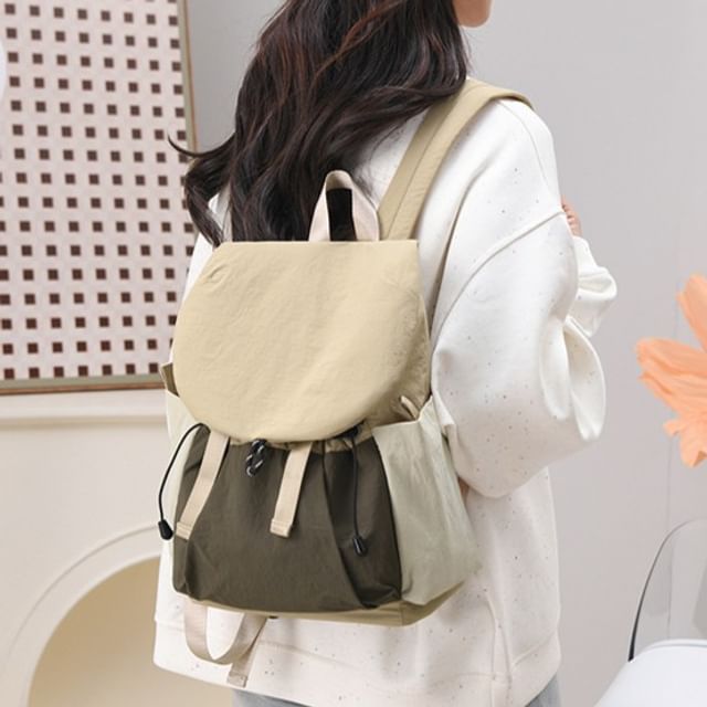 leopar-Two-Tone Drawstring Flap Backpack