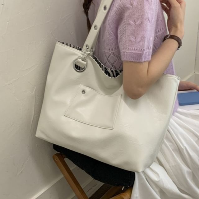 Letheroni-Reversible Zebra Print Grommet Tote Bag