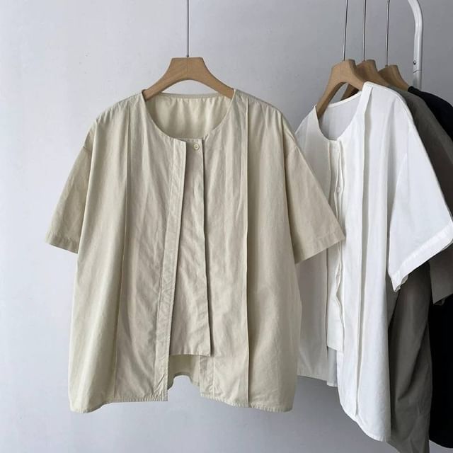 Lewwe-Short-Sleeve Crew Neck Plain Asymmetrical Blouse