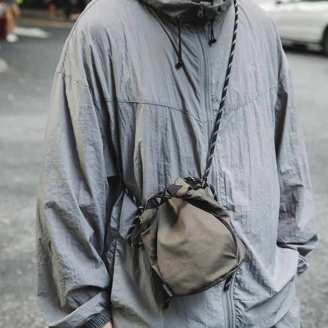 SEVENZ STUDIO-Buckled Nylon Crossbody Bucket Bag